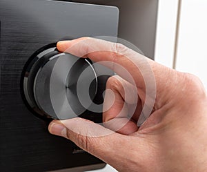 volume knob of an amplifier up