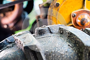 Volumetric rubber tread on a tractor wheel close-up. Mud tread pattern for greater flotation on agricultural machinery