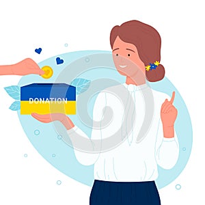 Volunteer woman holding donation box in yellow blue colors of Ukrainian flag to donate hearts