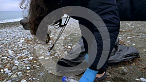 Volunteers clean up trash on the beach in the fall. Environmental issues