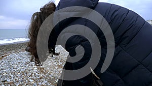 Volunteers clean up trash on the beach in the fall. Environmental issues