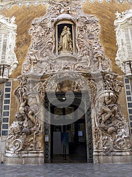 Voluptuous entrance to the Palace of the Marquis de Dos Aguas (18th century). Valencia, Spain.