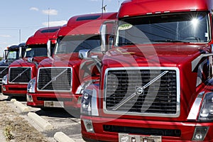 Volvo Semi Tractor Trailer Trucks Lined up for Sale. Volvo is one of the largest truck manufacturers VI