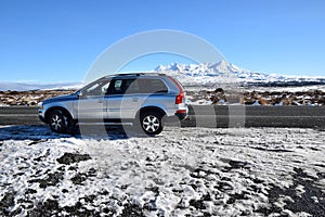 A Volvo XC90 on a mountain road