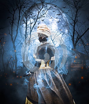 Voodoo queen or Lady shaman photo