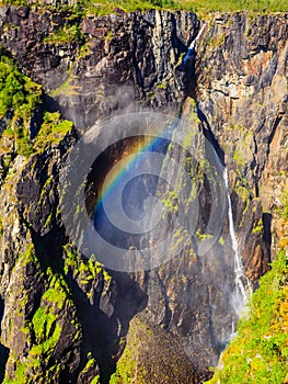 Voringsfossen waterfall with rainbow, Norway