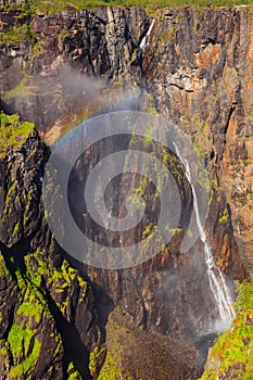 Voringsfossen waterfall with rainbow, Norway