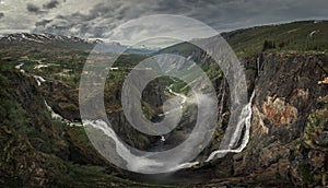 Voringsfossen waterfall in a valley at Hardangervidda National Park from above in Norway