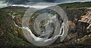 Voringsfossen waterfall in a valley at Hardangervidda National Park from above in Norway