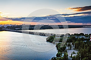 Voronezh from rooftop, evening and sunset, North bridge, panoramic view. Dramatic cityscape, skyline