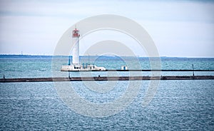 Vorontsovsky lighthouse near a pier in Odessa port photo