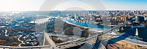 Voroshilovskiy Bridge above Don river and Rostov On Don aerial panoramic view of beautiful winter Russian city