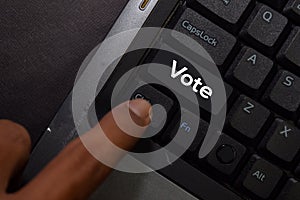 Vote isolated on laptop keyboard background