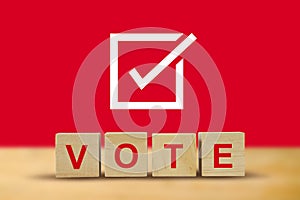 Vote on word letters cube, hand putting voting paper in the ballot box ,  illustration