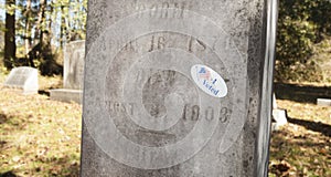 Voted sticker on a grave