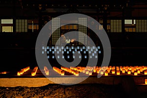 Votive candle light at Japanese temple, Kyoto Japan.