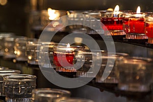 Votive Candles in Church, Red.