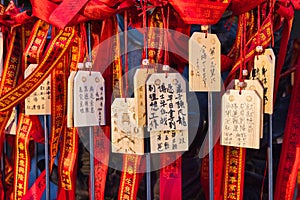 votive tablets hanging at the Mazu Miao Temple in Chinatown, Yokohama, Japan