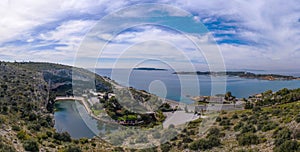 Vouliagmeni lake and nearby coastal area, aerial drone view, Athens Greece