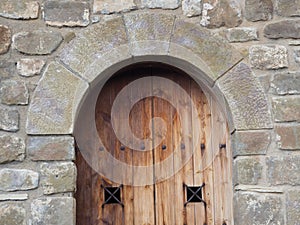 Voussoir arch of the entrance to the hermitage of Santa Eulalia de Rialb, Lleida, Spain, Europe