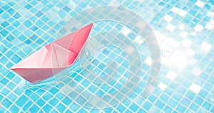 Voyage. Floating pink paper boat water pool abstract ship symbol. Blue water travel abstract boat travel concept paper