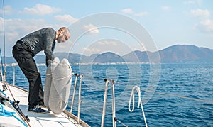 Voyage race sail on professional sport sea yacht. Mooring fender. Yachting summer vacation cruise. Captain yachtsman