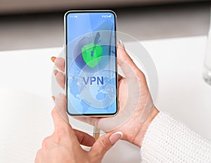VPN Virtual Private Network App Opened On Smartphone In Woman`s Hands