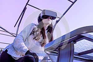 VR background pink purple blue girl face woman virtual reality headset brunette phone futuristic violet sky furniture