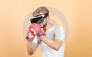 Vr boxing. future innovation. man in VR glasses. Futuristic gaming. boxing in virtual reality. Digital sport success