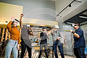 VR Business People wearing virtual reality with touching air and dancing during VR Meeting Conference at the office