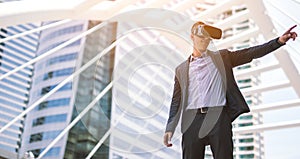 VR Goggles. Man wearing virtual reality goggles Concept Simulation Business, Smart businessman in a suit.