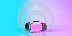 VR headset virtual reality. 3d digital glasses on futuristic neon tech background. Innovation device, cyberspace