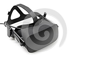 VR virtual reality headset half turned on white background. Gaming future device, virtual reality glasses. Copy space for