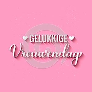 Vrouwendag - Happy Womens Day in Dutch. Calligraphy hand lettering on pink background. International Womans day photo
