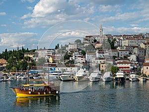 VRSAR, CROATIA - 06/19/2018: View from city port to Saint Martin`s Church