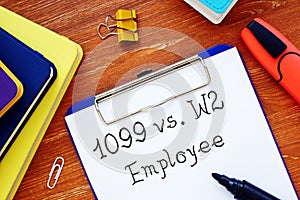 1099 vs. W2 Employee sign on the piece of paper