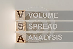 VSA is an abbreviation of the Volume Spread Analysis - the text is written on wooden cubes