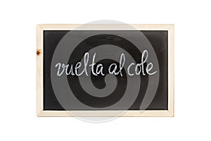 Vuelta al cole Back to school words write in chalk on a blackboard photo