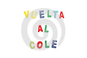Vuelta al cole write with colored toy wooden letters Back to school