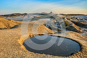 Vulcanii noroiosi Mud Volcanoes Romania lanscape sunset rocky dry landmark