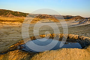 Vulcanii noroiosi Mud Volcanoes Romania lanscape sunset rocky dry landmark