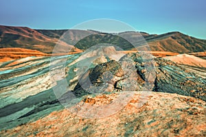 Vulcanii noroiosi Mud Volcanoes Romania lanscape sunset rocky dry landmark photo