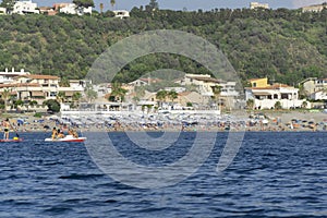 Vulcano city island beach with tourist landscape on sunny day