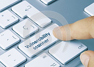 Vulnerability scanner - Inscription on Blue Keyboard Key photo
