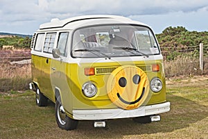 VW caravanette with smiley face