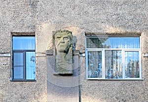 Vyborg. Russia. Fragment of a building in the National Romantic Style. Mask on the wall