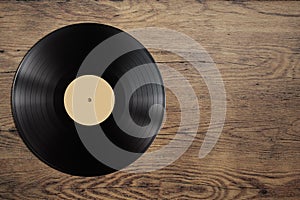 Vynil record disc on wooden table