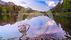 VÃÂ¶lser Weiher in SÃÂ¼dtirol, Reflection of mountain in lake, Longexposure Landscape, Dolomites photo