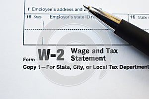 W-2 Tax Form With Pen Close Up High Quality