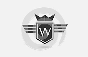 W alphabet letter logo icon for company in black and white. Creative badge design with king crown wings and shield for business